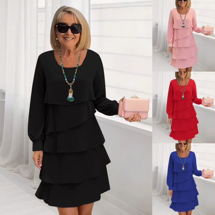 Damer lagerklänning med flödande design och långa ärmar Eva Jonsson-Eva Jonsson