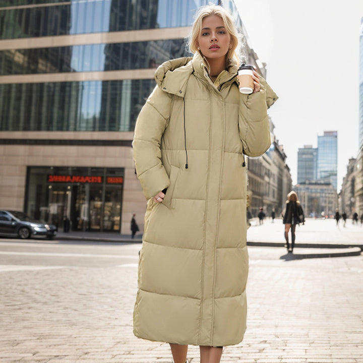 Damer lång puffer-kappa med lyxig konstpälskrage och praktiska fickor Mirla-Eva Jonsson