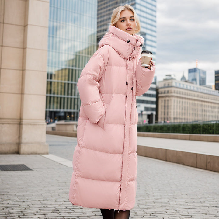 Damer lång puffer-kappa med lyxig konstpälskrage och praktiska fickor Mirla-Eva Jonsson