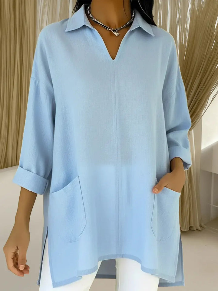 Damer långärmad blus med elegant V-ringning och praktiska fickor Mirla-Eva Jonsson