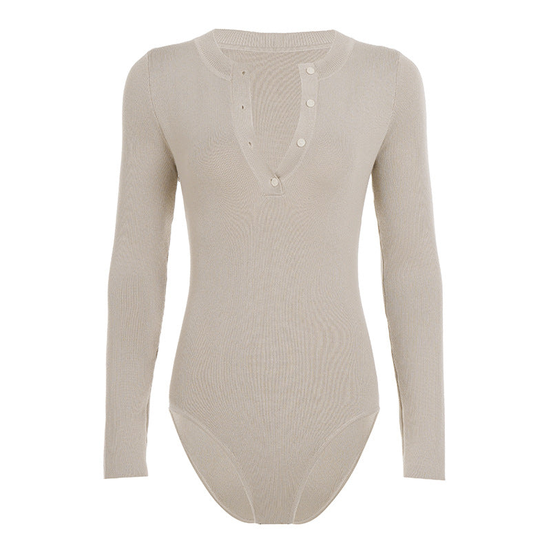 Damer långärmad bodysuit med knappdetalj och strukturerat material Mirla-Eva Jonsson