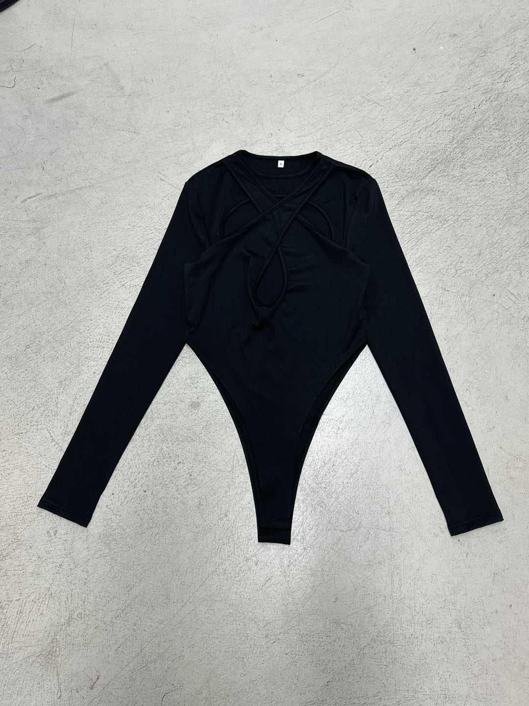 Damer långärmad bodysuit med sofistikerad korsdesign och hög midja Mirla-Eva Jonsson