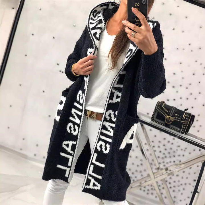 Damer långärmad stickad cardigan med huva och praktiska fickor Mirla-Eva Jonsson