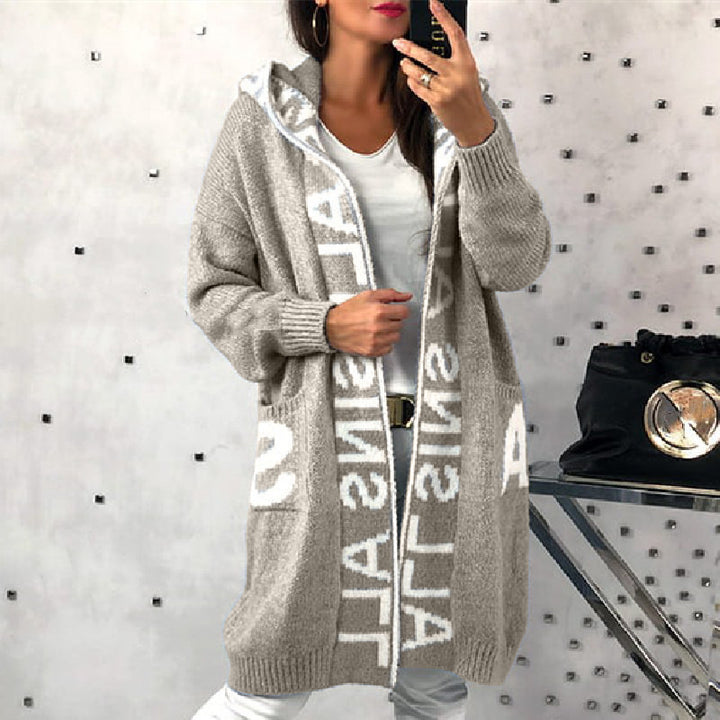 Damer långärmad stickad cardigan med huva och praktiska fickor Mirla-Eva Jonsson