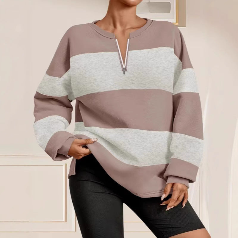 Damer långärmad sweatshirt med modern dragkedja och randig design Mirla-Eva Jonsson