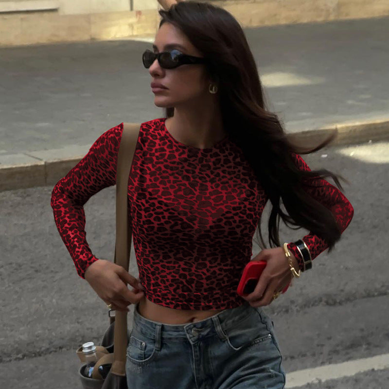 Damer långärmad topp med leopardmönster och figurnära skärning Mirla-Eva Jonsson