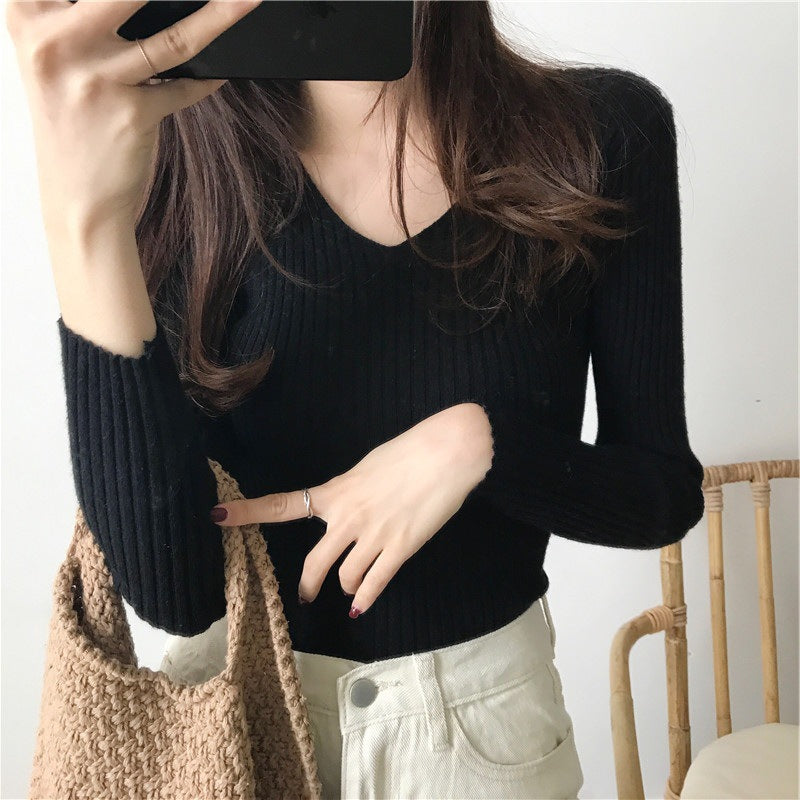 Damer långärmad tröja med V-ringning och strukturerad ribbdesign Mirla-Eva Jonsson