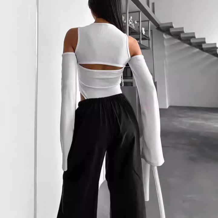 Damer långärmad tröja med innovativ cut-out-design och smala ärmar Mirla-Eva Jonsson