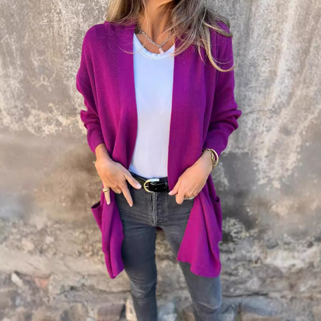 Damer långstickad jacka med praktiska fickor och elegant V-ringning Eva Jonsson-Eva Jonsson