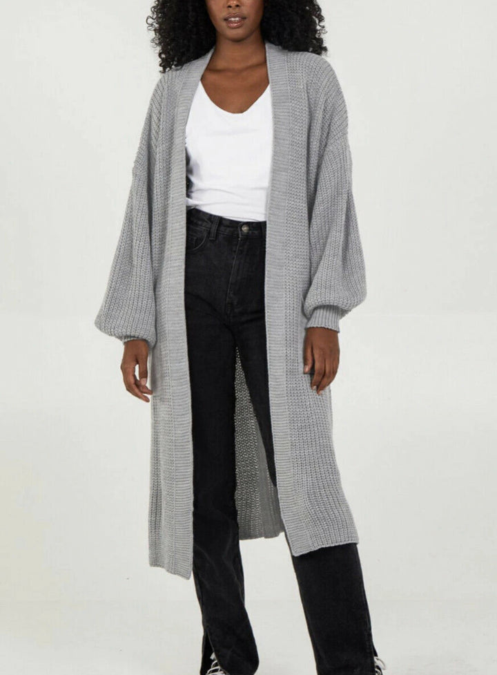 Damer långstrickjacka med avslappnad oversized passform och voluminösa ärmar Eva Jonsson-Eva Jonsson