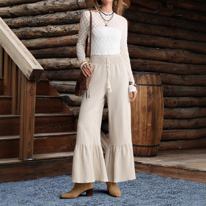 Damer lediga Palazzo-byxor med elastisk midja och fashionabla knytband Mirla-Eva Jonsson