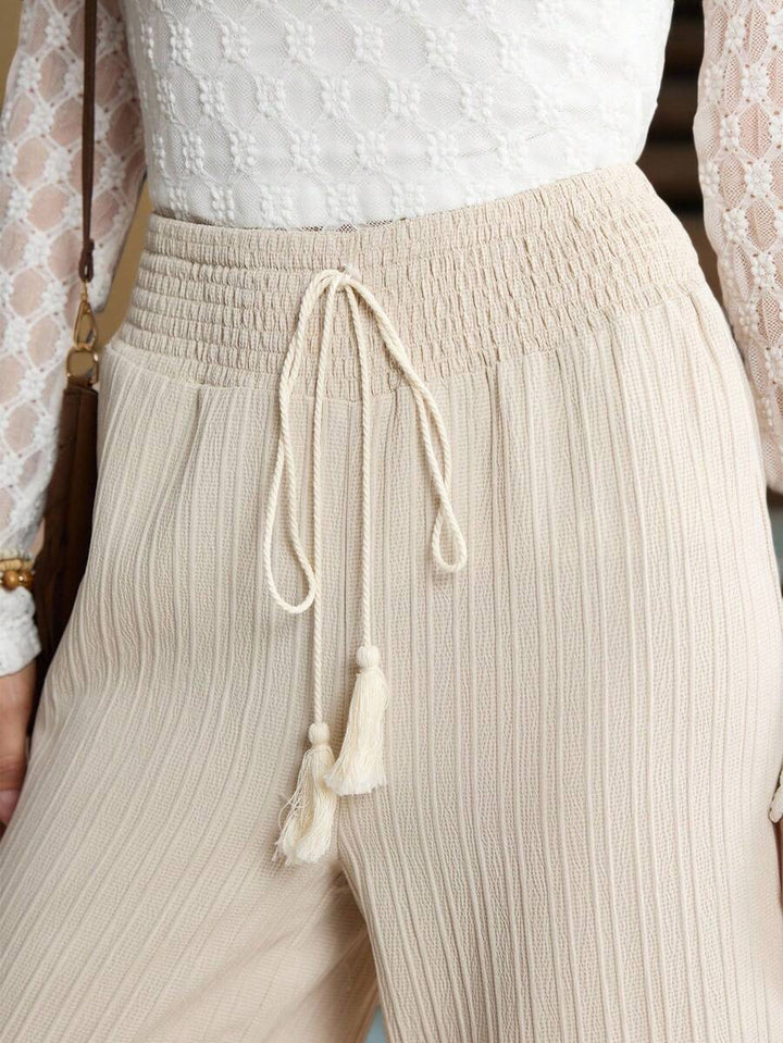 Damer lediga Palazzo-byxor med elastisk midja och fashionabla knytband Mirla-Eva Jonsson