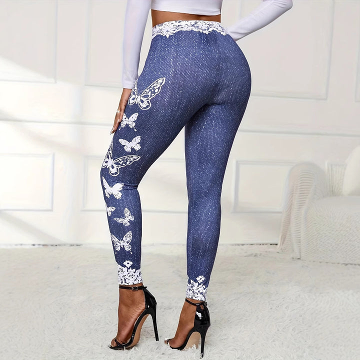 Damer leggings med blommig spetsmidja och fjärilsmotiv Mirla-Eva Jonsson