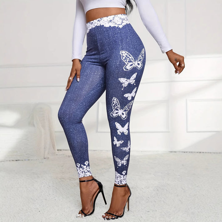 Damer leggings med blommig spetsmidja och fjärilsmotiv Mirla-Eva Jonsson