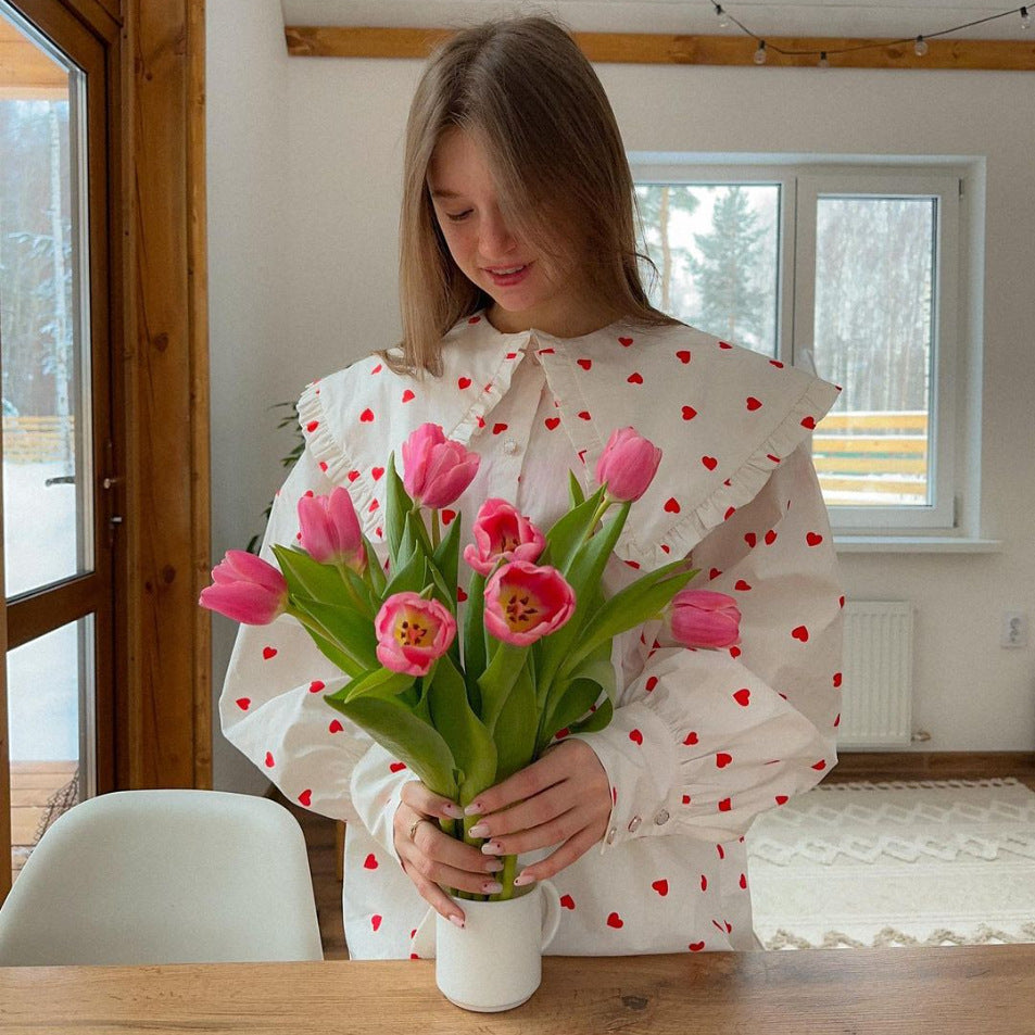 Damer lekfullt skuren blus med volanger Mirla-Eva Jonsson