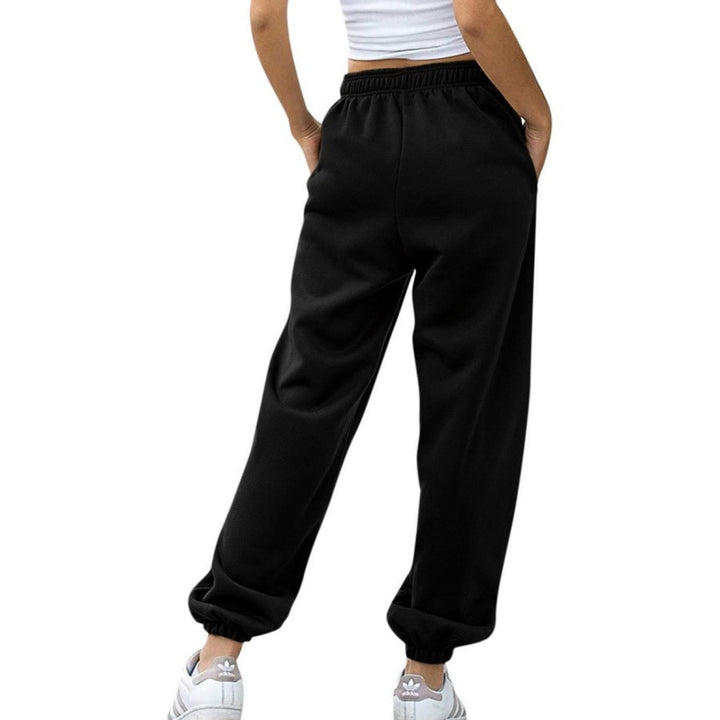 Damer lösa sweatpants med elastisk midja och sidfickor Mirla-Eva Jonsson