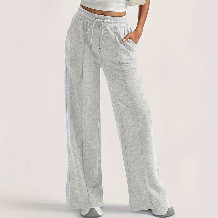 Damer lösa sweatpants med sidofickor och elastisk midja Mirla-Eva Jonsson