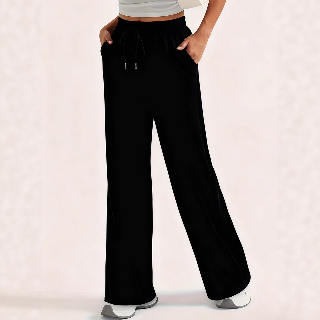 Damer lösa sweatpants med sidofickor och elastisk midja Mirla-Eva Jonsson