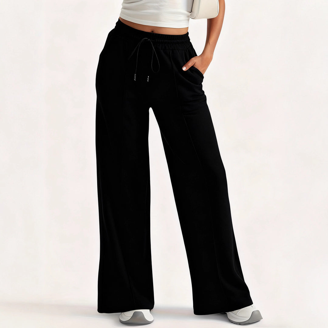 Damer lösa sweatpants med sidofickor och elastisk midja Mirla-Eva Jonsson