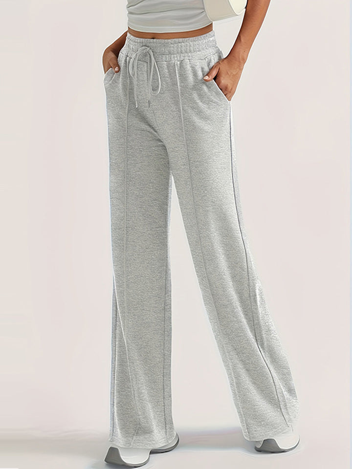 Damer lösa sweatpants med sidofickor och elastisk midja Mirla-Eva Jonsson