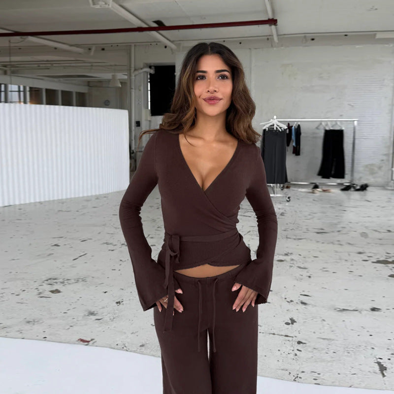 Damer löst jumpsuit med omslagdesign och långa ärmar Mirla-Eva Jonsson