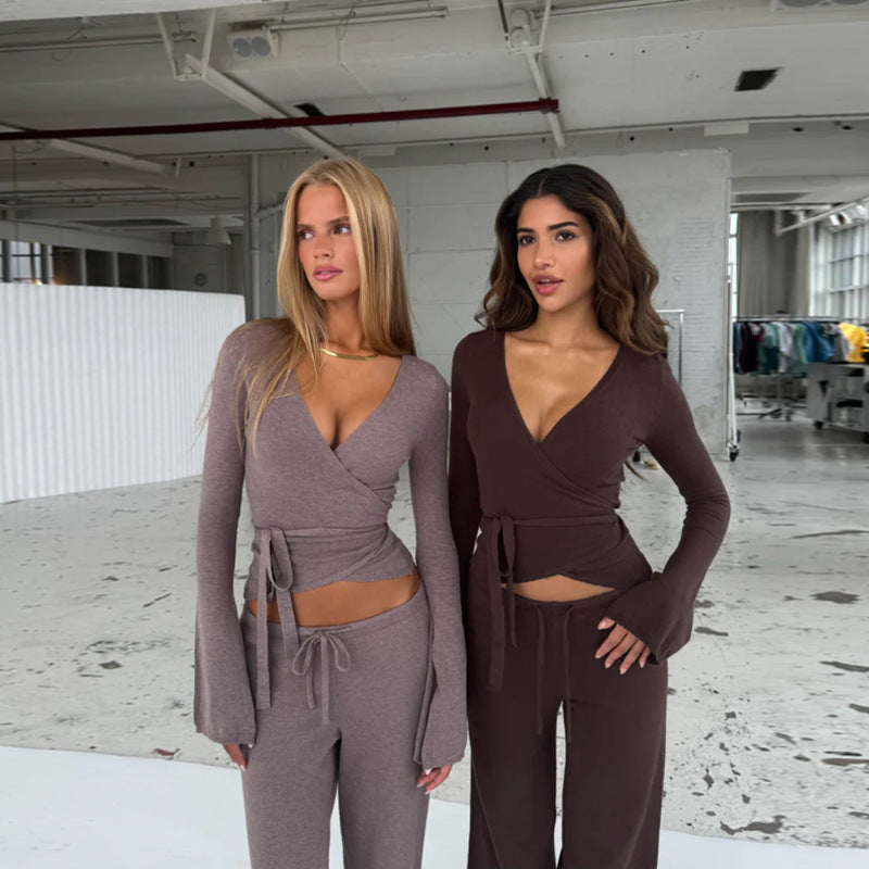Damer löst jumpsuit med omslagdesign och långa ärmar Mirla-Eva Jonsson
