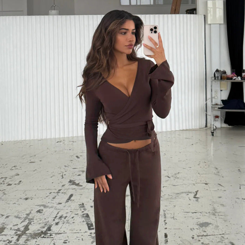 Damer löst jumpsuit med omslagdesign och långa ärmar Mirla-Eva Jonsson