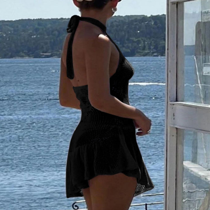 Damer luftig strandklänning med fint hängmönster och voluminös fåll Mirla-Eva Jonsson