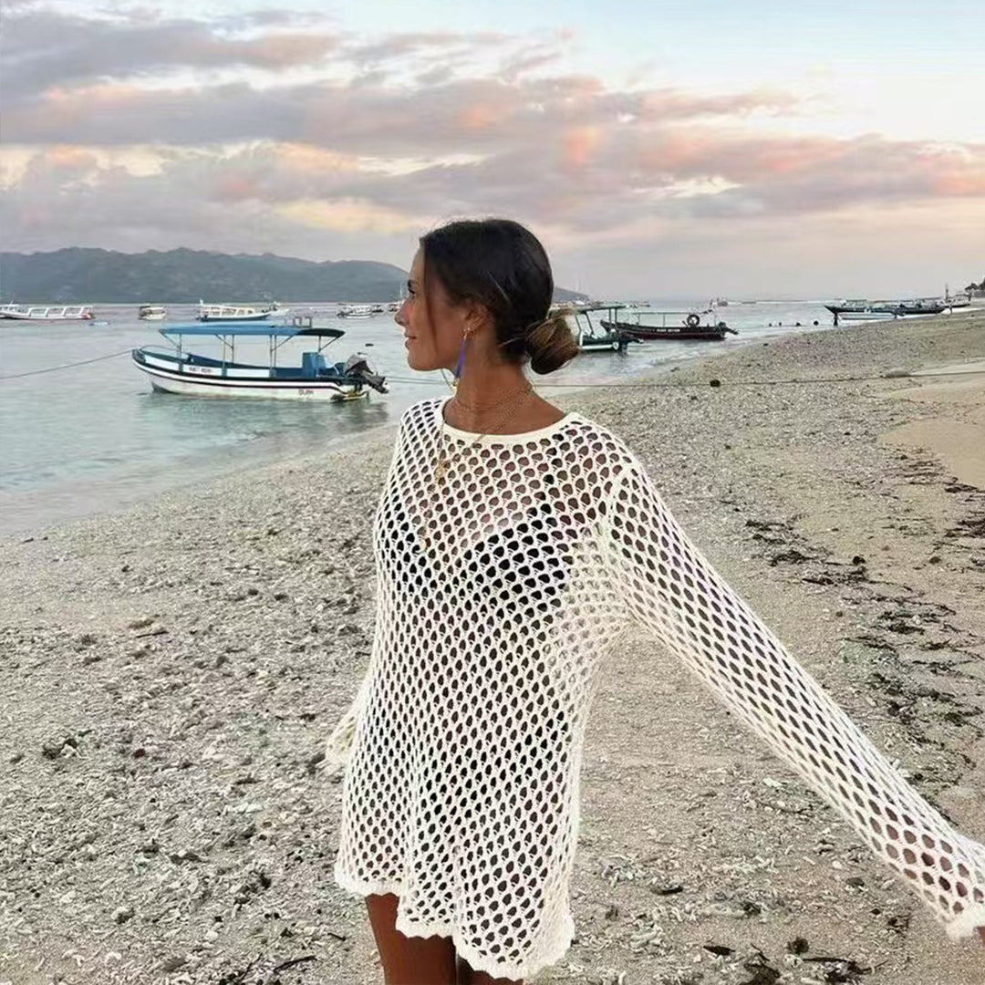 Damer luftig virkad strandöverdrag med vida ärmar och asymmetrisk fåll Mirla-Eva Jonsson
