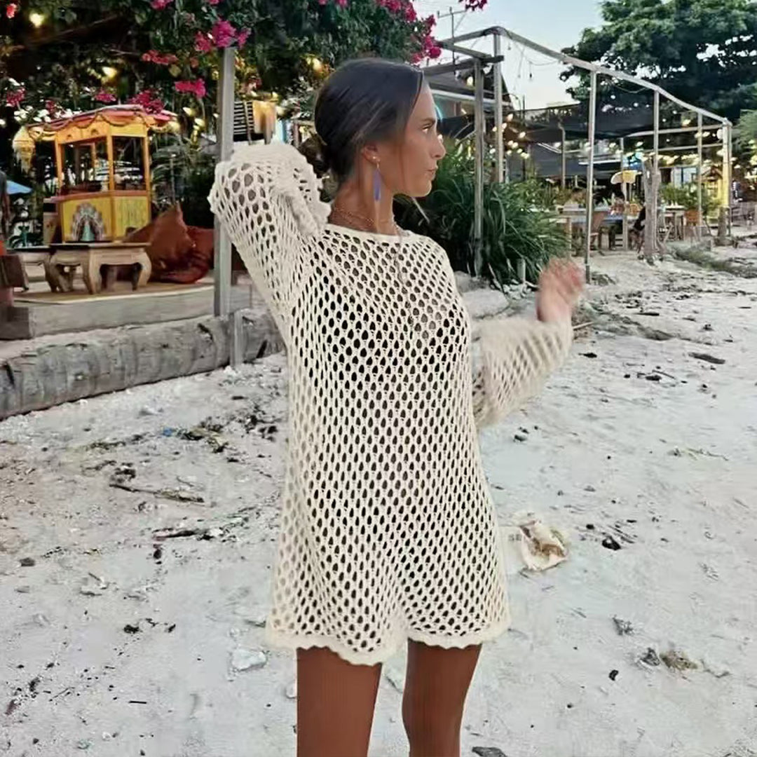 Damer luftig virkad strandöverdrag med vida ärmar och asymmetrisk fåll Mirla-Eva Jonsson