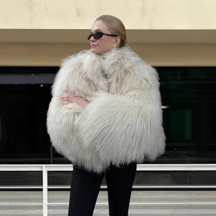 Damer lyxig pälsjacka med voluminösa ärmar och elegant skärning Mirla-Eva Jonsson