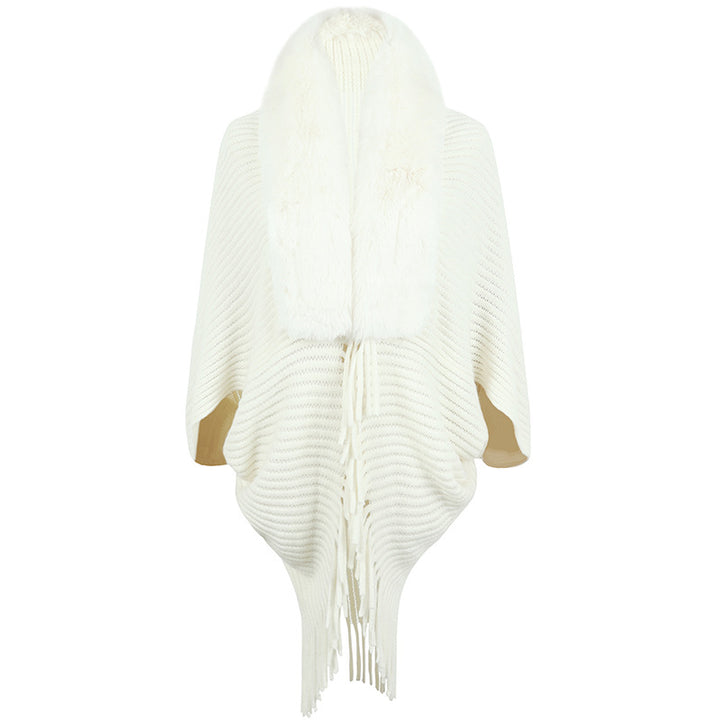 Damer lyxig stickad poncho med elegant konstpälskrage och fransar Mirla-Eva Jonsson