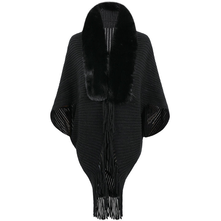 Damer lyxig stickad poncho med elegant konstpälskrage och fransar Mirla-Eva Jonsson