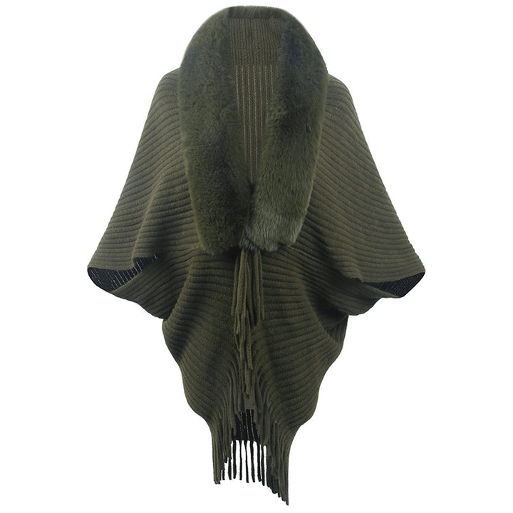 Damer lyxig stickad poncho med elegant konstpälskrage och fransar Mirla-Eva Jonsson