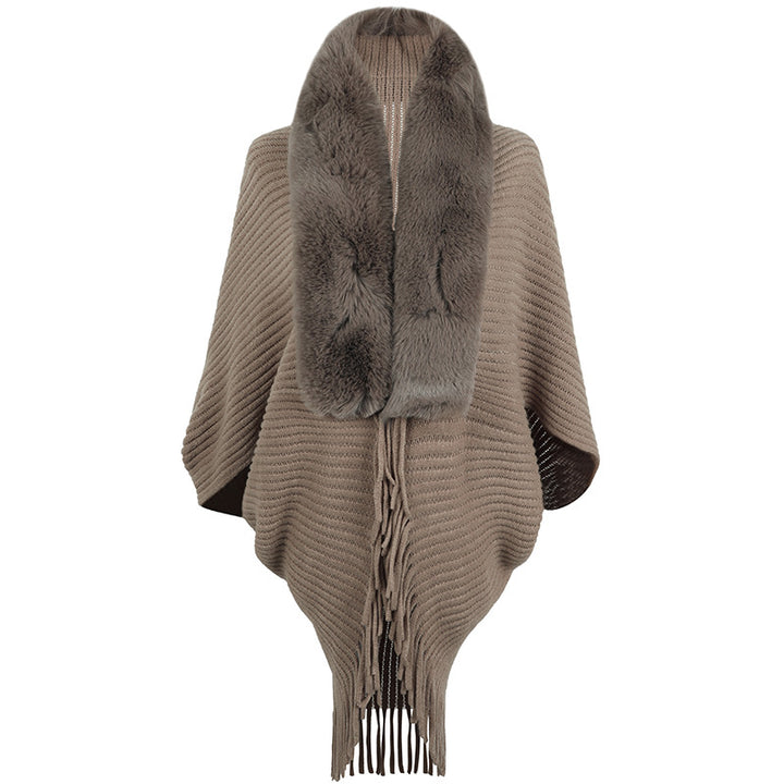 Damer lyxig stickad poncho med elegant konstpälskrage och fransar Mirla-Eva Jonsson