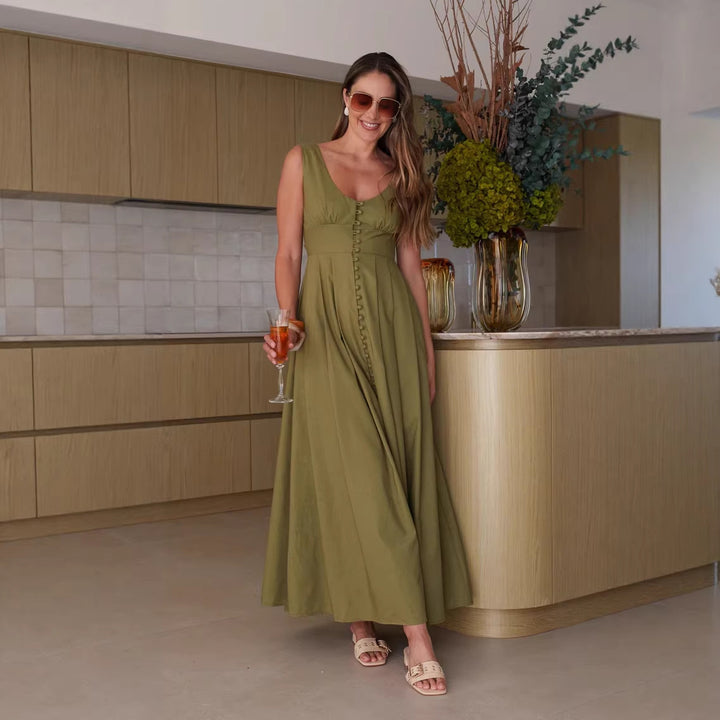 Damer maxi klänning med chic knappdesign och elegant V-hals Mirla-Eva Jonsson