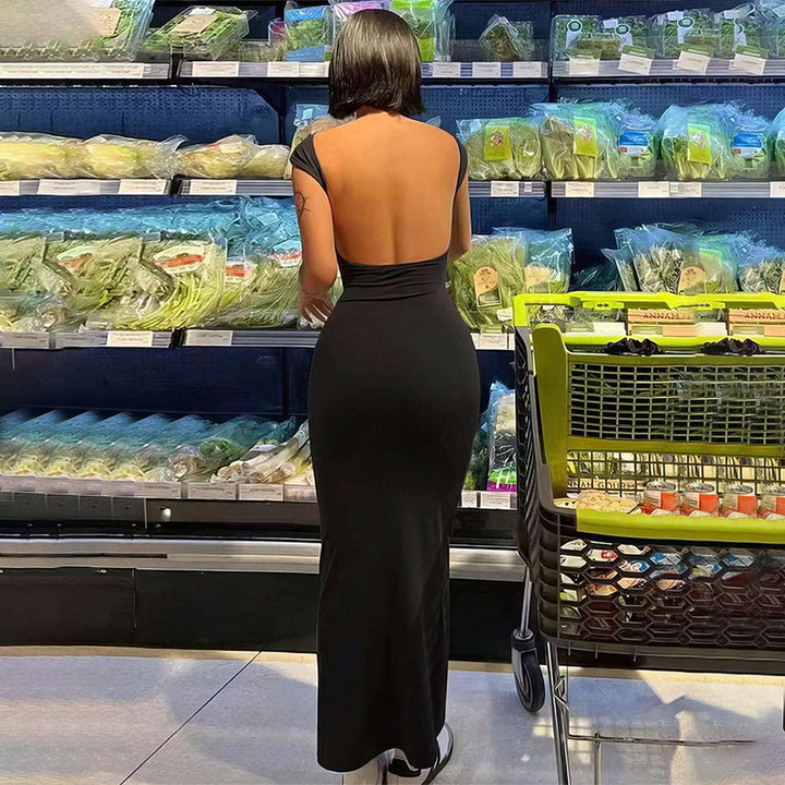 Damer maxi klänning med elegant ryggutskärning och figurnära silhuett Mirla-Eva Jonsson