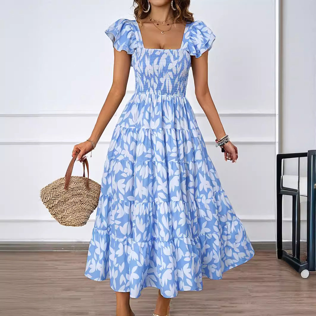 Damer maxi klänning med voluminösa volangdetaljer och svängande kjol Mirla-Eva Jonsson