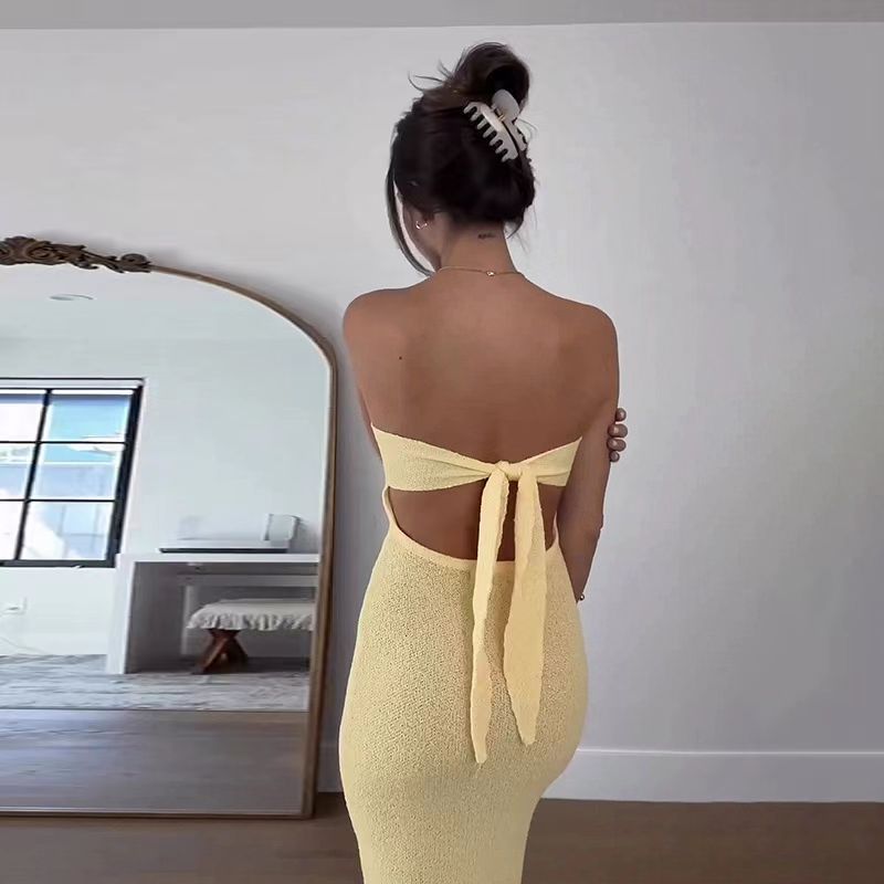 Damer maxikjol med elegant bandeau-uttalning och minimalistisk silhuett Mirla-Eva Jonsson