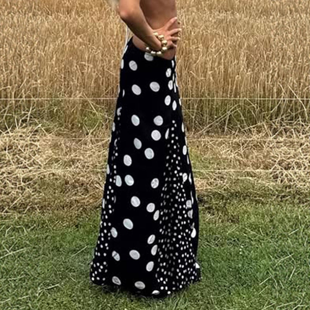 Damer maxikjol med kontrasterande polka prickar design och vid passform Mirla-Eva Jonsson