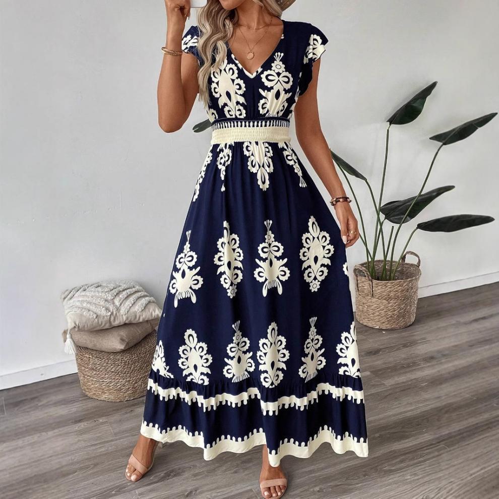 Damer maxiklänning med blommig print och smickrande V-ringning Mirla-Eva Jonsson