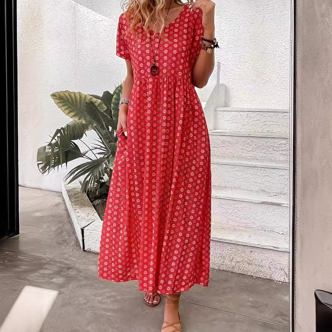 Damer maxiklänning med blommönster och generösa sidofickor Mirla-Eva Jonsson