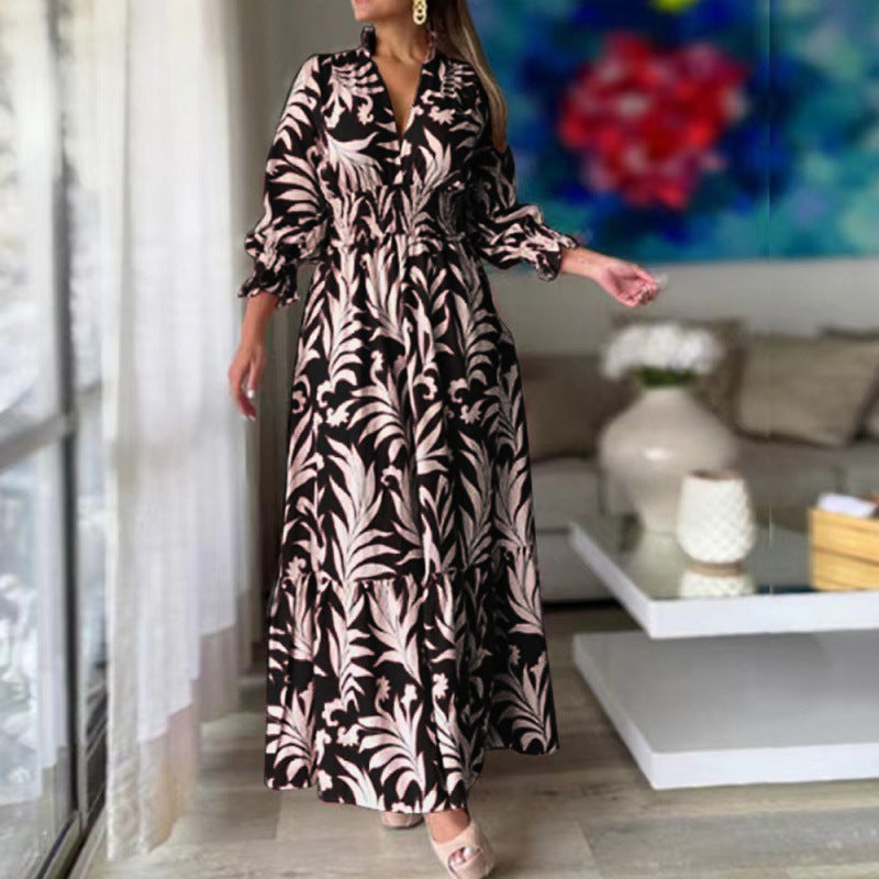 Damer maxiklänning med blommönster och voluminösa ärmar Mirla-Eva Jonsson
