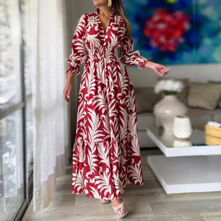 Damer maxiklänning med blommönster och voluminösa ärmar Mirla-Eva Jonsson