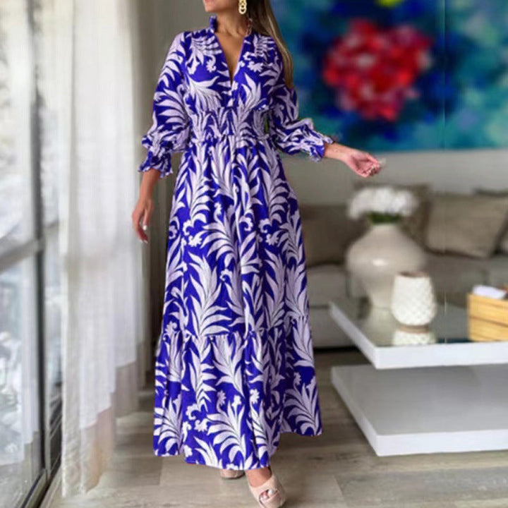 Damer maxiklänning med blommönster och voluminösa ärmar Mirla-Eva Jonsson