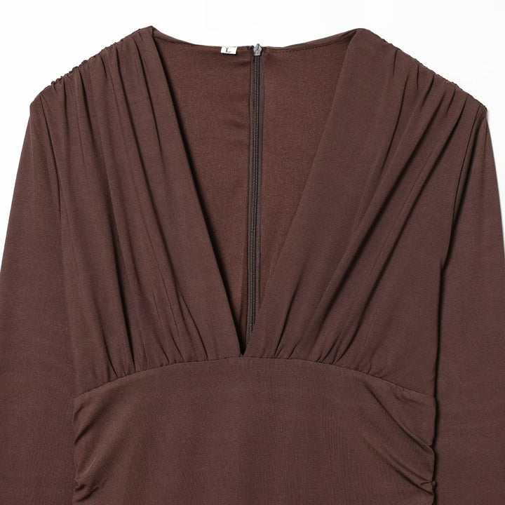 Damer maxiklänning med djup V-ringning och draperade detaljer Mirla-Eva Jonsson