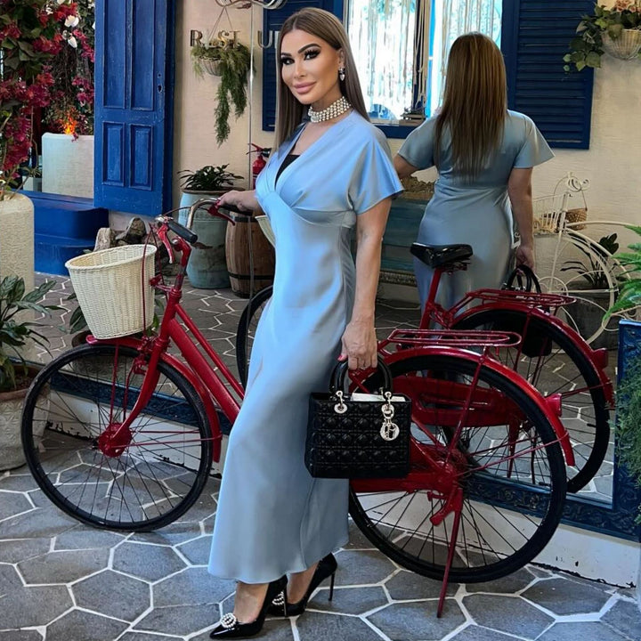 Damer maxiklänning med elegant vikoverdel och svepande fåll Mirla-Eva Jonsson