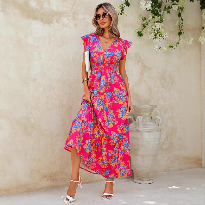 Damer maxiklänning med flödande tyg och blommiga mönster Eva Jonsson-Eva Jonsson