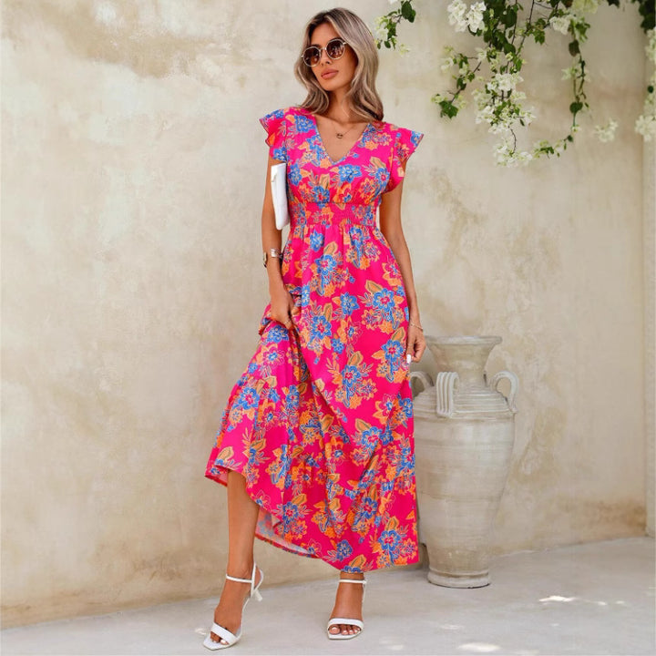 Damer maxiklänning med flödande tyg och blommiga mönster Eva Jonsson-Eva Jonsson