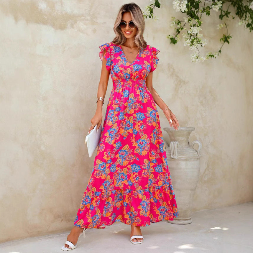 Damer maxiklänning med flödande tyg och blommiga mönster Eva Jonsson-Eva Jonsson